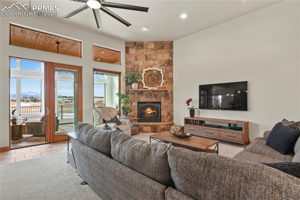 Image 6 of 50: Great room with access to sun room and southwest facing deck