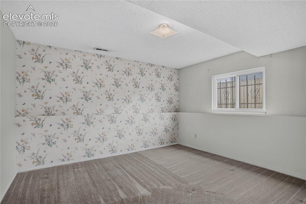 Image 17 of 21: Bedroom 4 - lower level