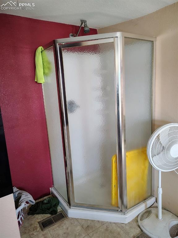 Image 29 of 30: Home 3 extra shower and sink in main bedroom