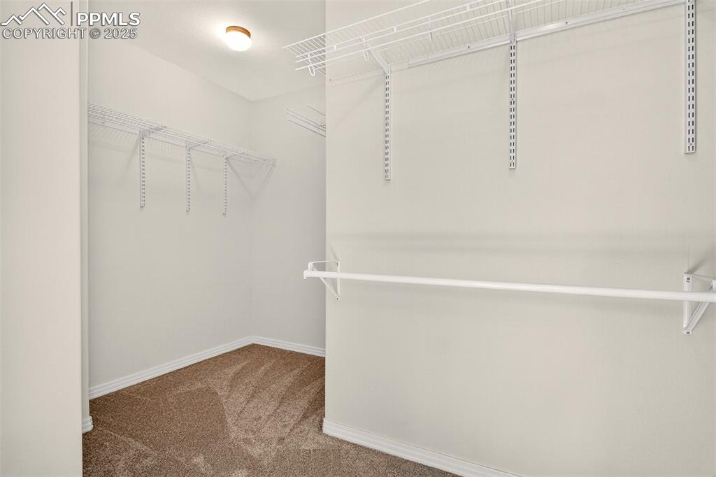 Image 18 of 41: Huge walk-in closet