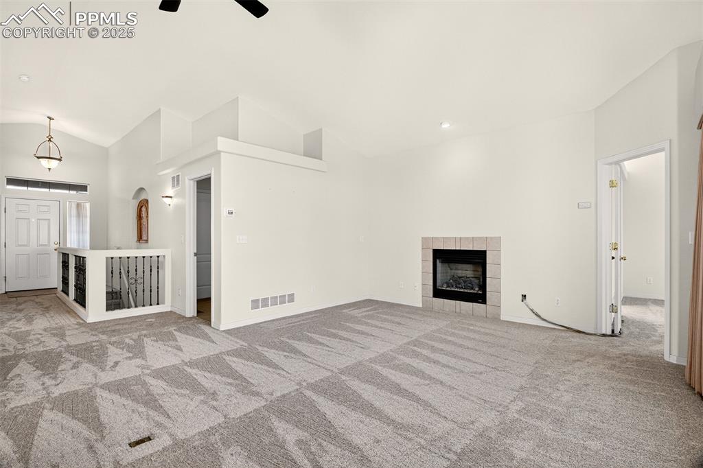 Image 8 of 41: Spacious living room filled with natural light