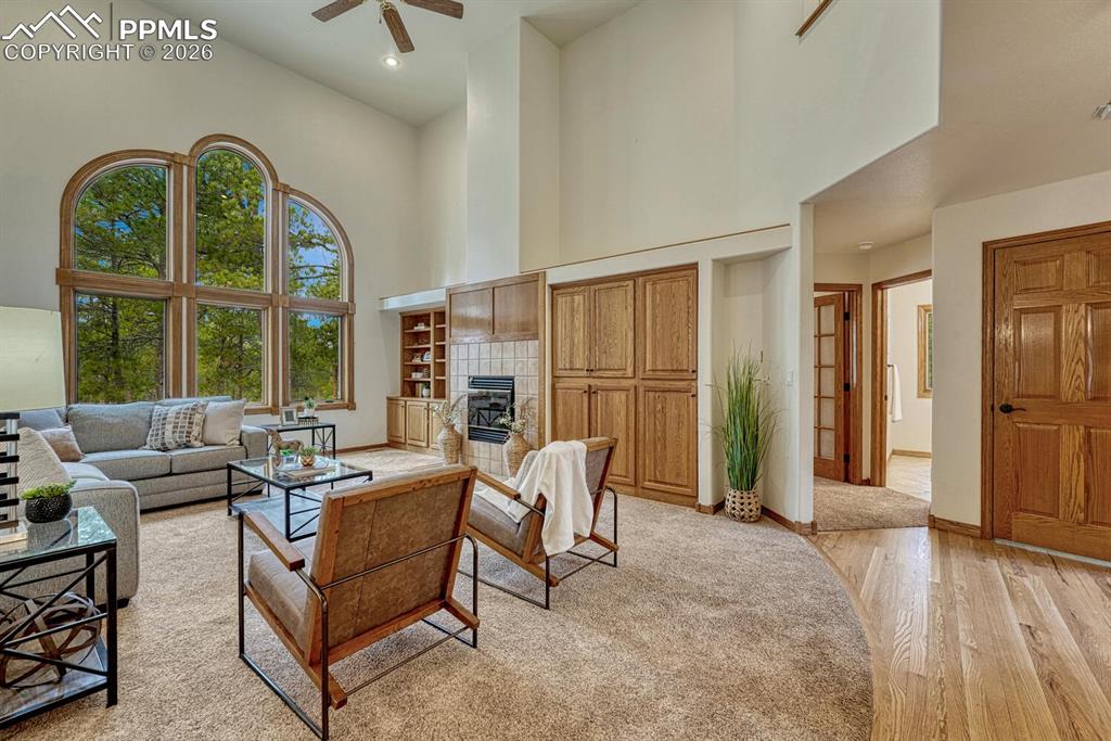 Image 14 of 50: The main level Bedroom and Powder Bathroom are located off the Family Room.