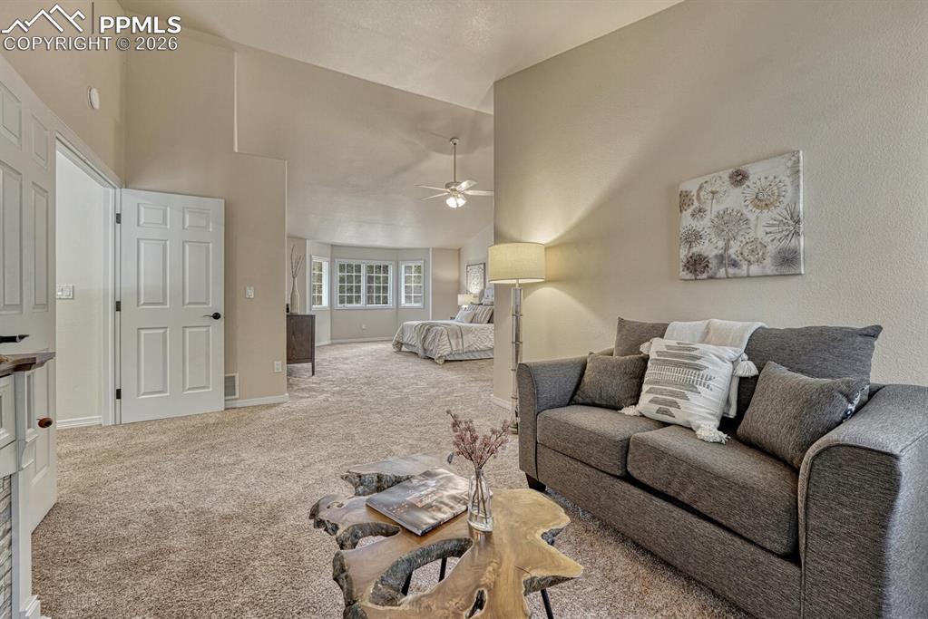 Image 30 of 50: View of the Primary Bedroom from the Sitting Room.