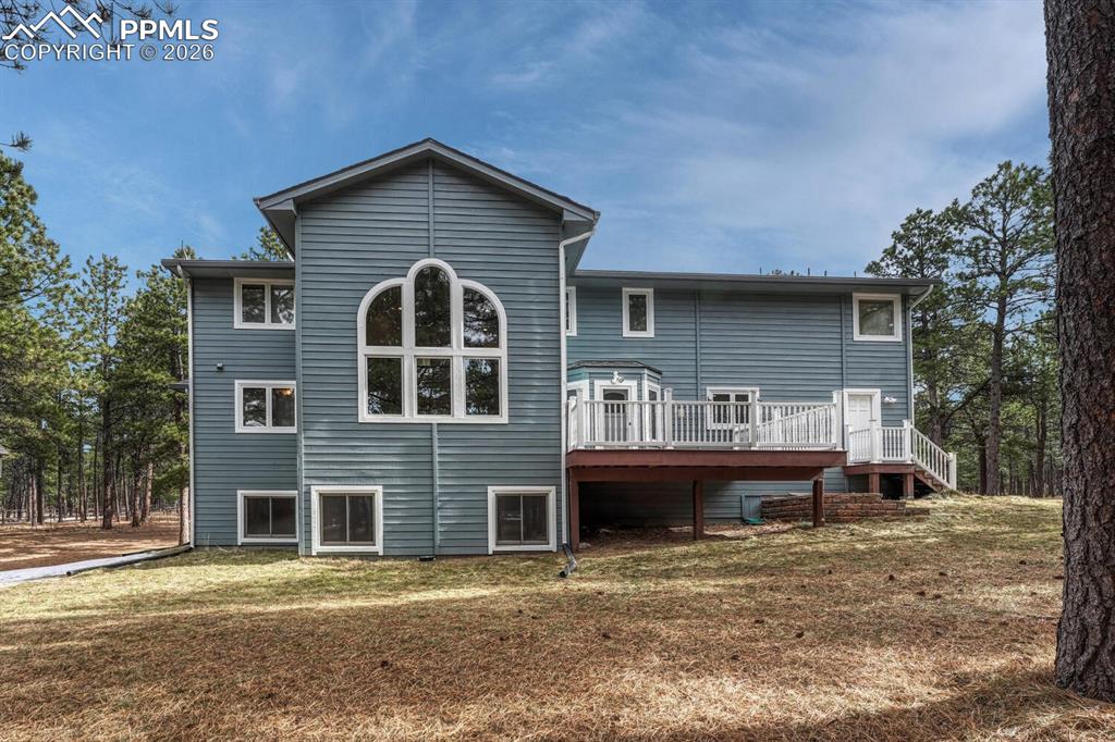 Image 44 of 50: Rear view of home.