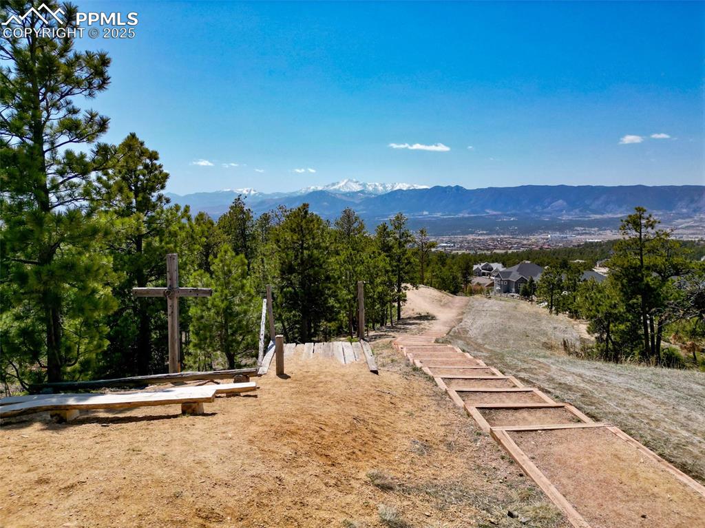 Image 47 of 50: View of Pikes Peak on the trails