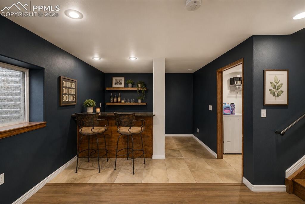 Image 11 of 17: built in dry bar