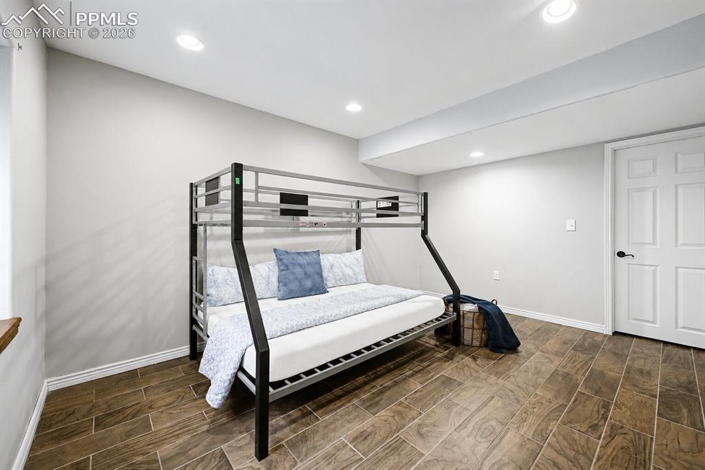 Image 15 of 16: oversized secondary lower level bedroom