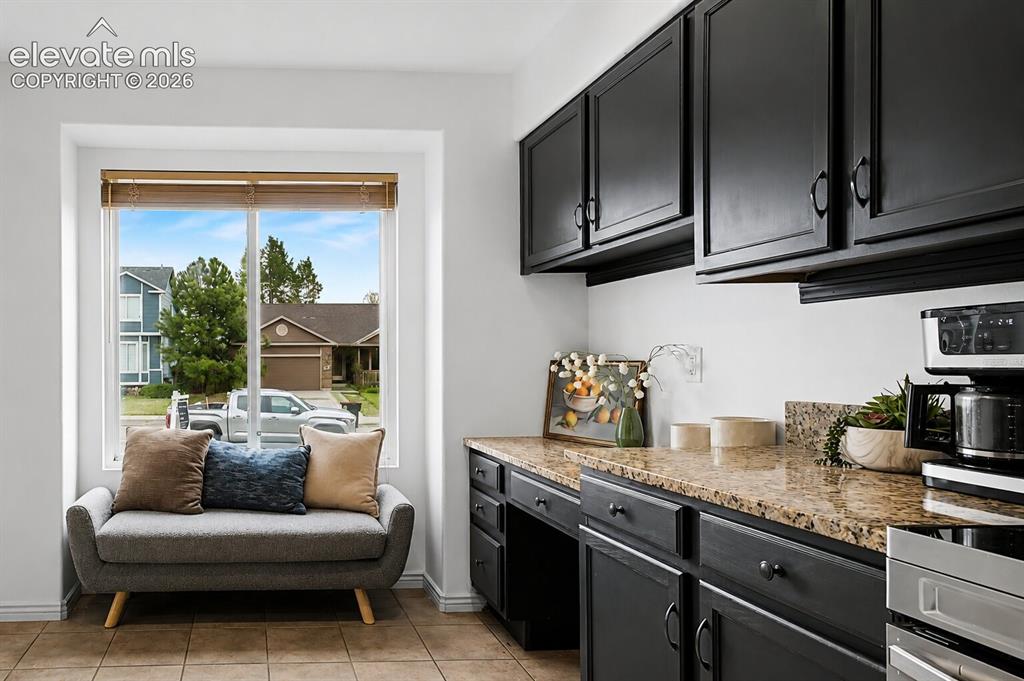 Image 5 of 17: kitchen nook + built in desk