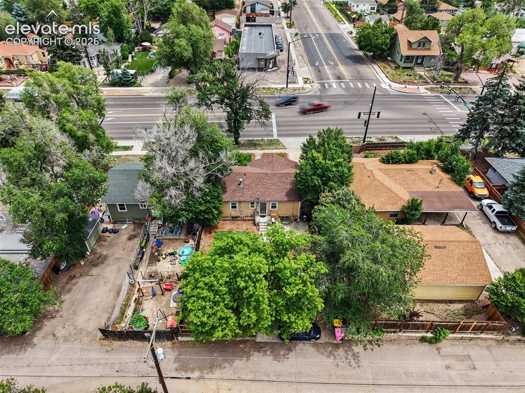 Image 34 of 36: Aerial perspective showcasing a residential neighborhood with prominent mou