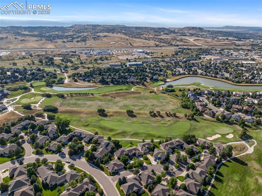 Image 43 of 46: View of property location with a water and mountain view, a local golf cour