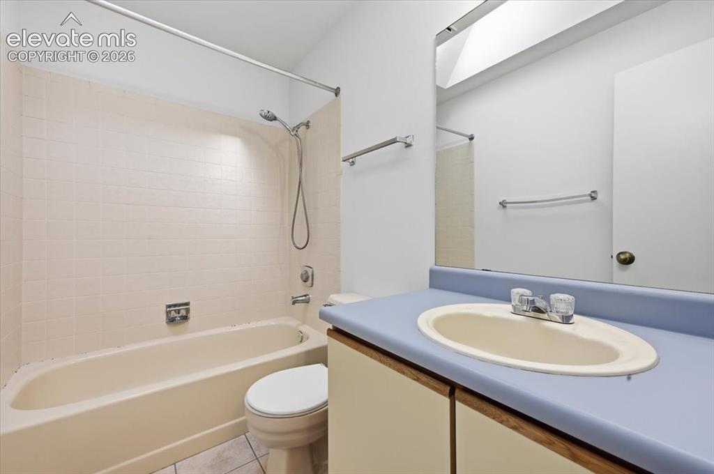 Image 20 of 26: Full upper-level bathroom with a tub-shower combo at , Colorado Springs, CO