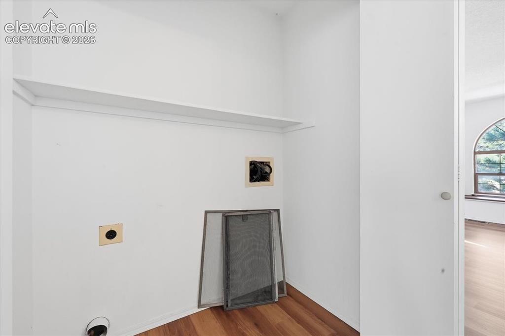 Image 21 of 26: Upper-level laundry area with electric hookups at , Colorado Springs, CO.