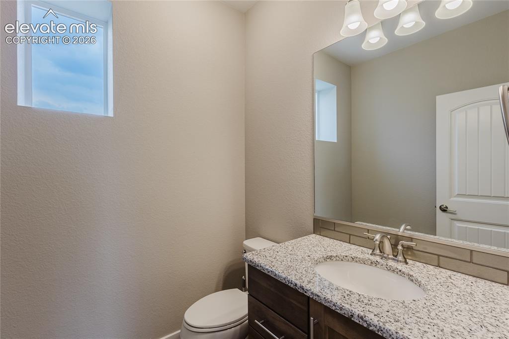 Image 19 of 45: Main-level half bath.