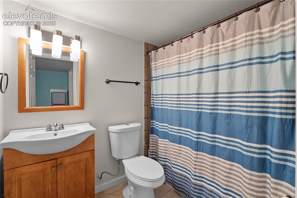 Image 19 of 21: basement full bath