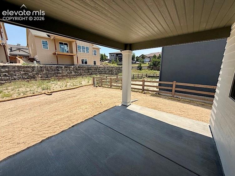 Image 10 of 50: Covered Rear Patio