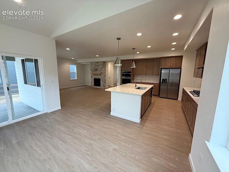Image 12 of 50: Dining Area and Kitchen