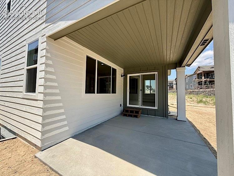 Image 13 of 50: Covered Rear Patio