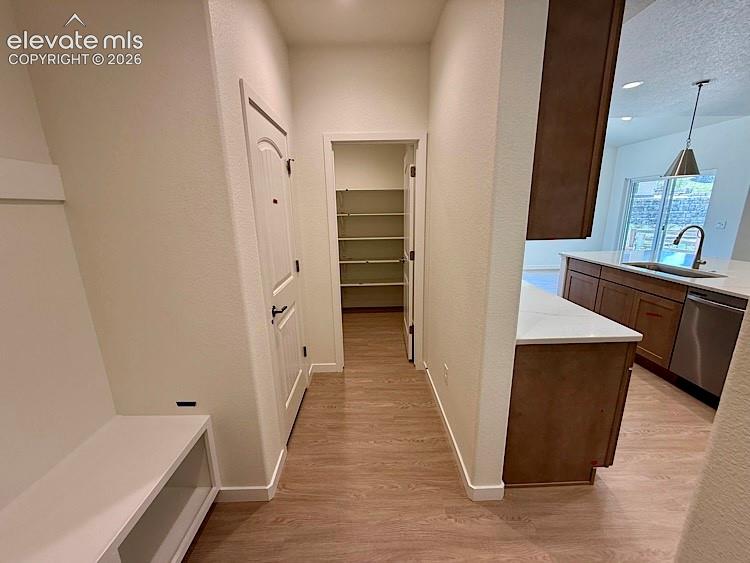 Image 15 of 50: Kitchen Pantry and Boot Bench