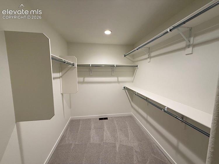 Image 25 of 50: Primary Walk-in Closet