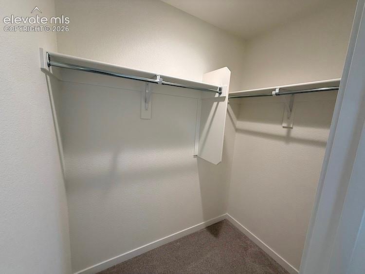 Image 41 of 50: Bedroom 3 Walk-in Closet