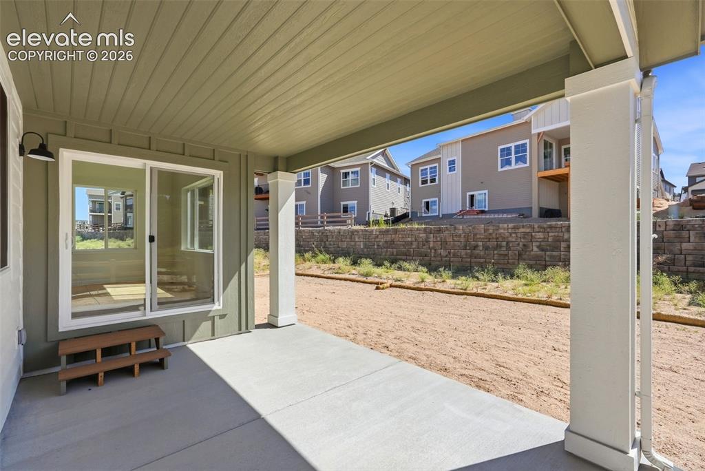 Image 46 of 50: Covered Rear Patio off the Dining area.