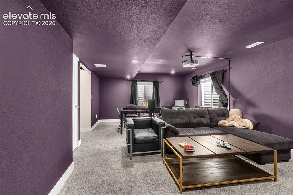 Image 29 of 43: Family room in basement