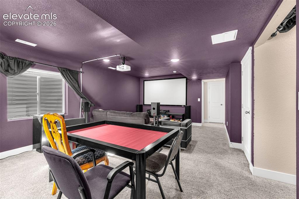 Image 30 of 43: Family room in basement