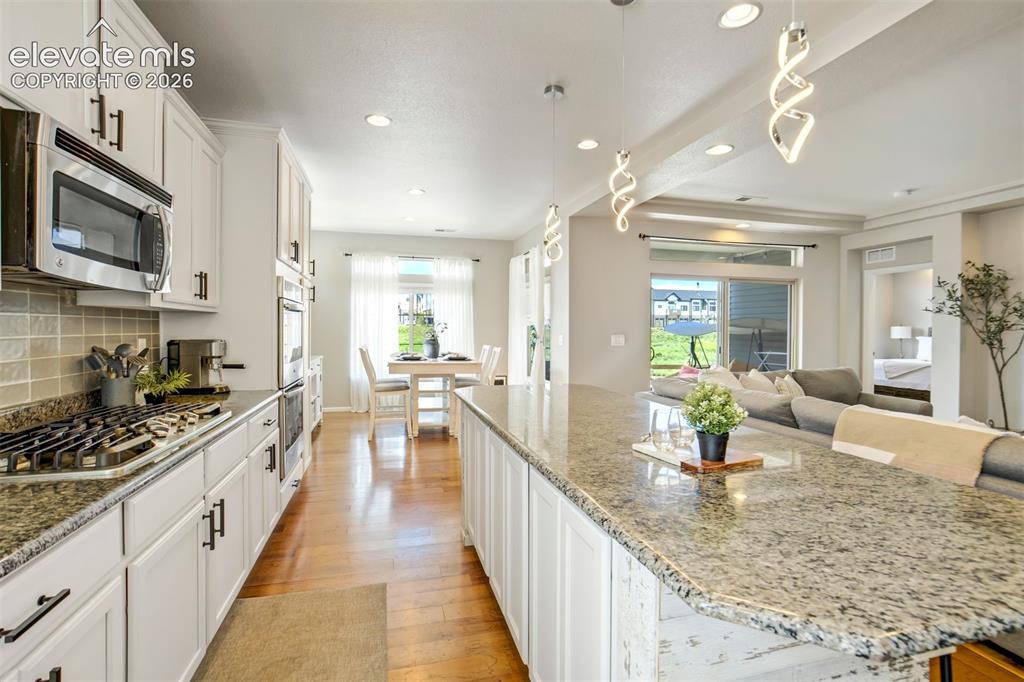 Image 10 of 46: A kitchen so inviting, people will suddenly volunteer to hang out while you