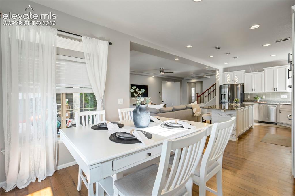 Image 12 of 46: Breakfast nook area off the kitchen.