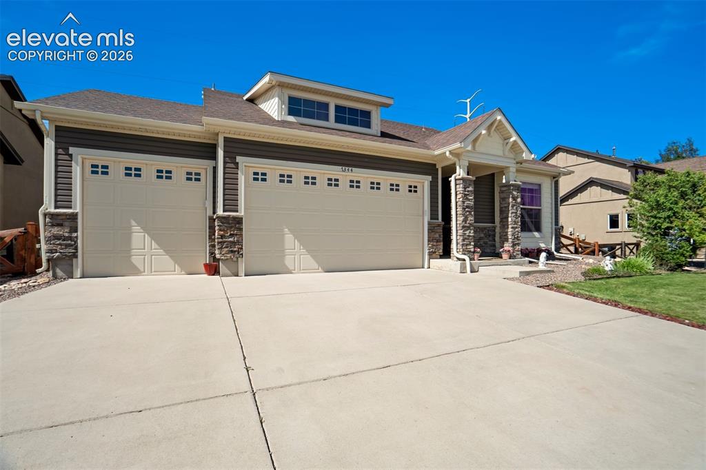 Image 3 of 46: Finally, a garage where parking and storage can peacefully coexist.