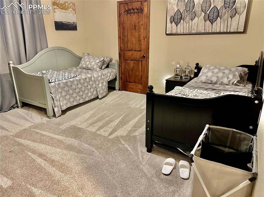 Image 23 of 33: View of carpeted bedroom