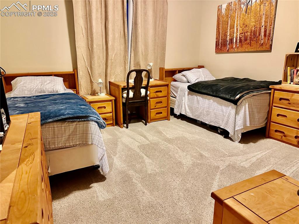 Image 25 of 33: View of carpeted bedroom