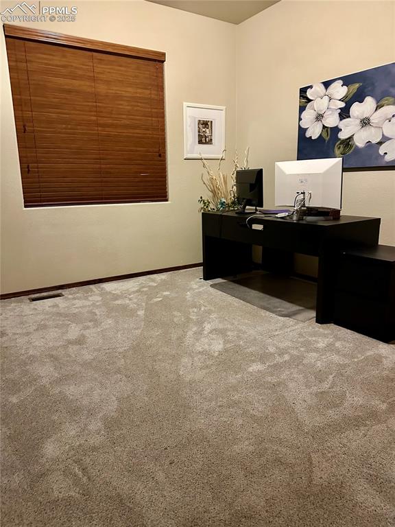Image 27 of 33: Home office featuring carpet flooring and baseboards