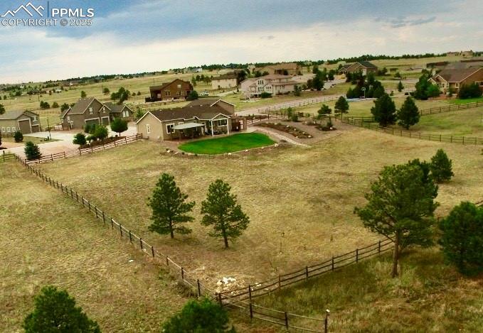Image 37 of 38: View of rural area featuring nearby suburban area