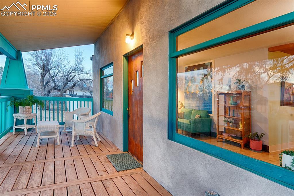 Image 11 of 50: Front porch looking into the living room