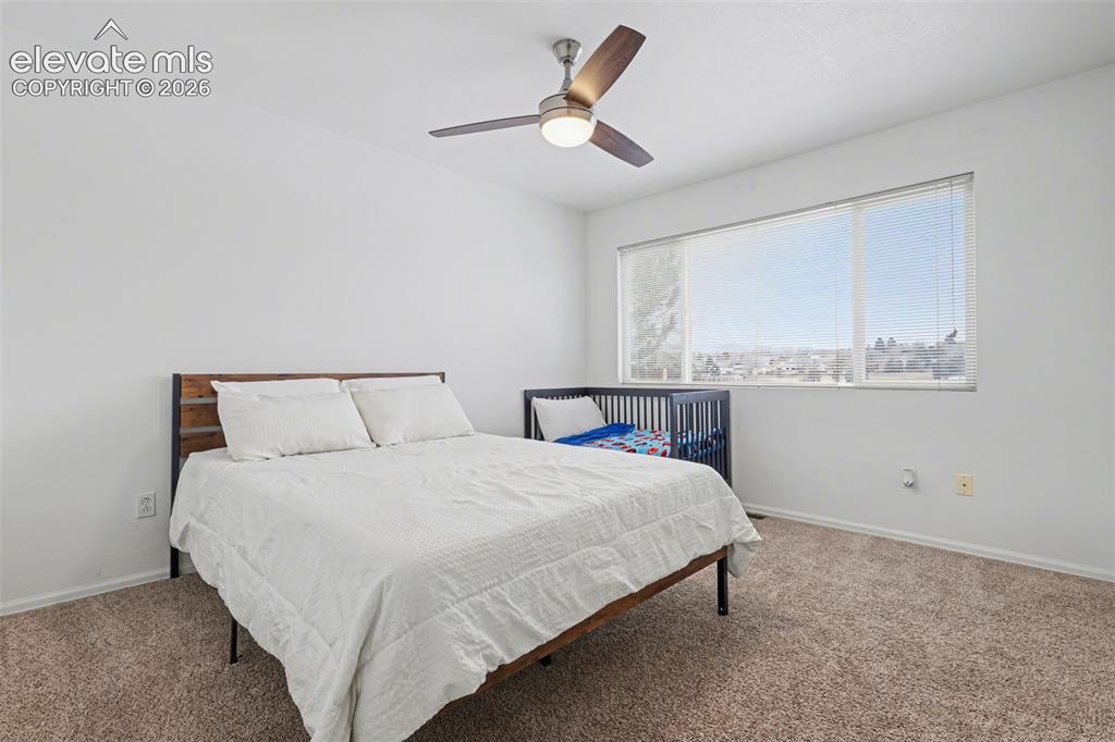 Image 13 of 34: Primary Bedroom w/Mountain Views & NO REAR NEIGHBORS