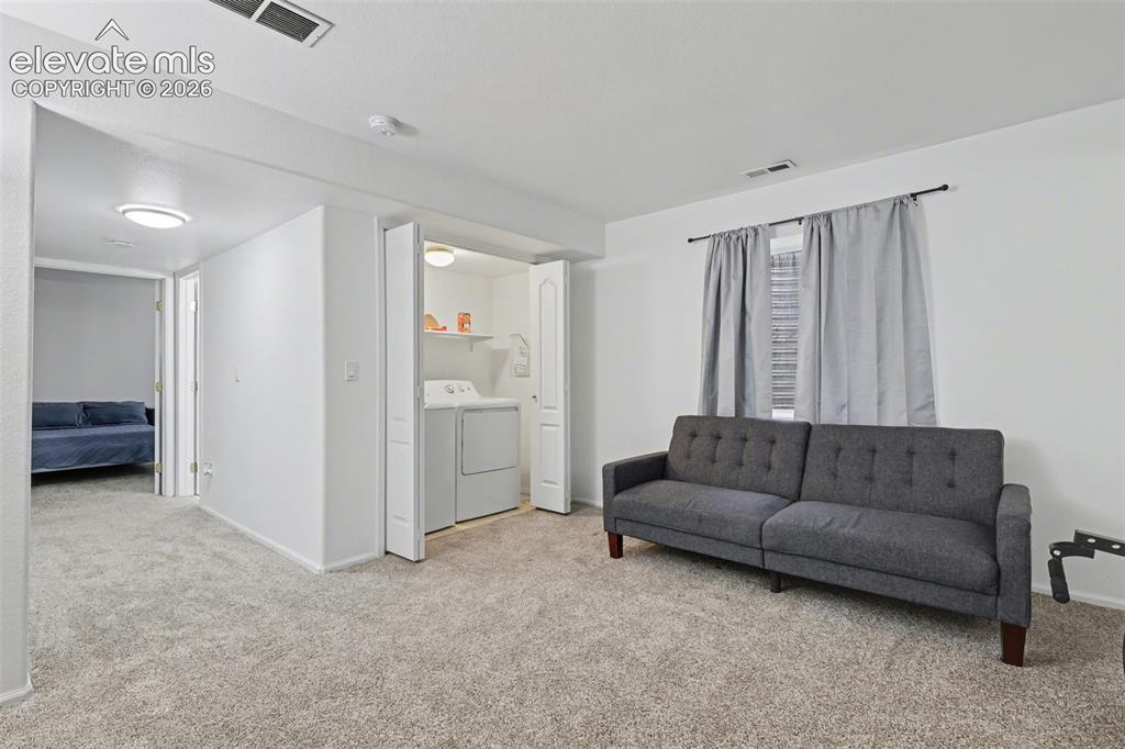 Image 19 of 34: Basement Family Room