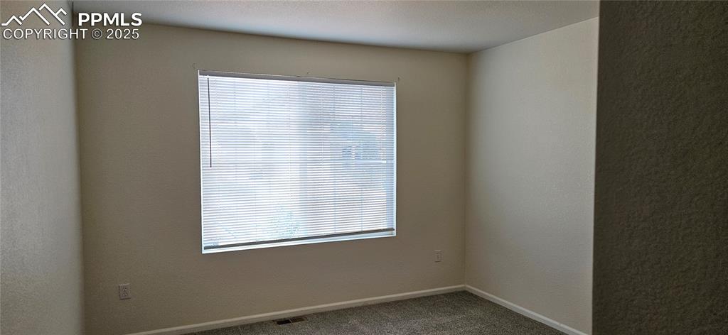 Image 16 of 26: Front facing bedroom