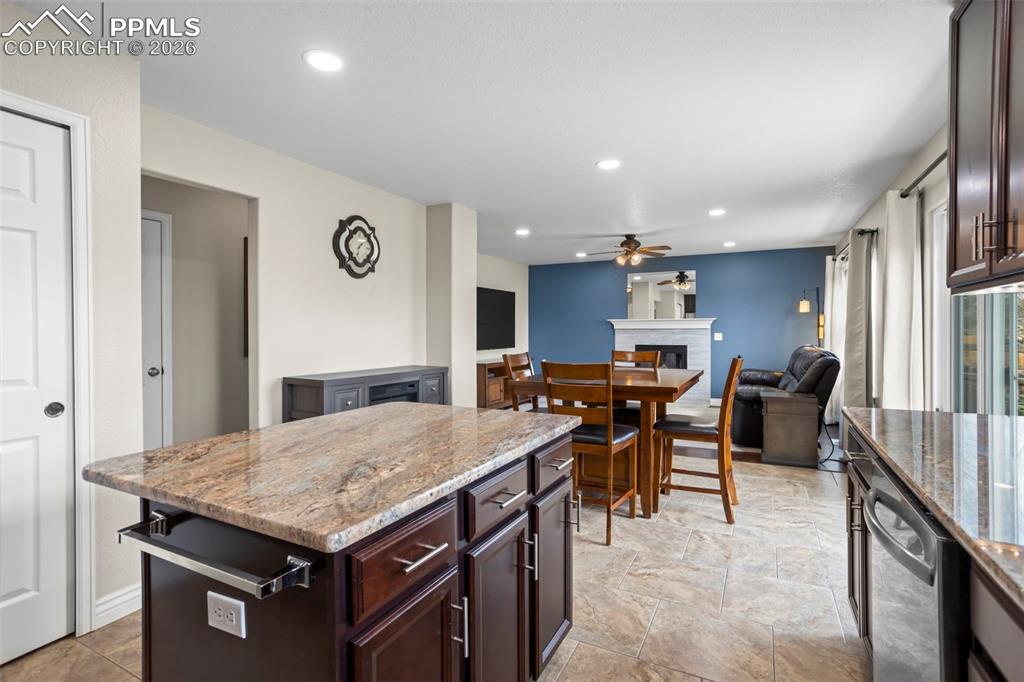 Image 5 of 21: Kitchen looking into Dining Room and Family Room