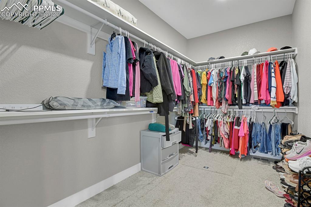 Image 33 of 49: Huge Walk-in Master Closet