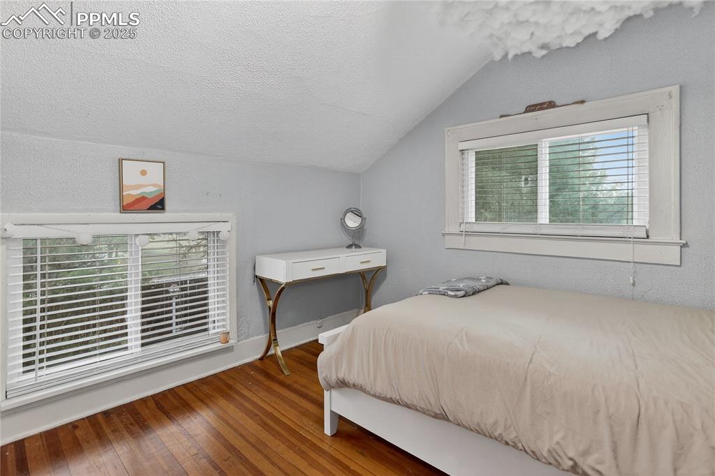 Image 12 of 50: 2nd upper level bedroom