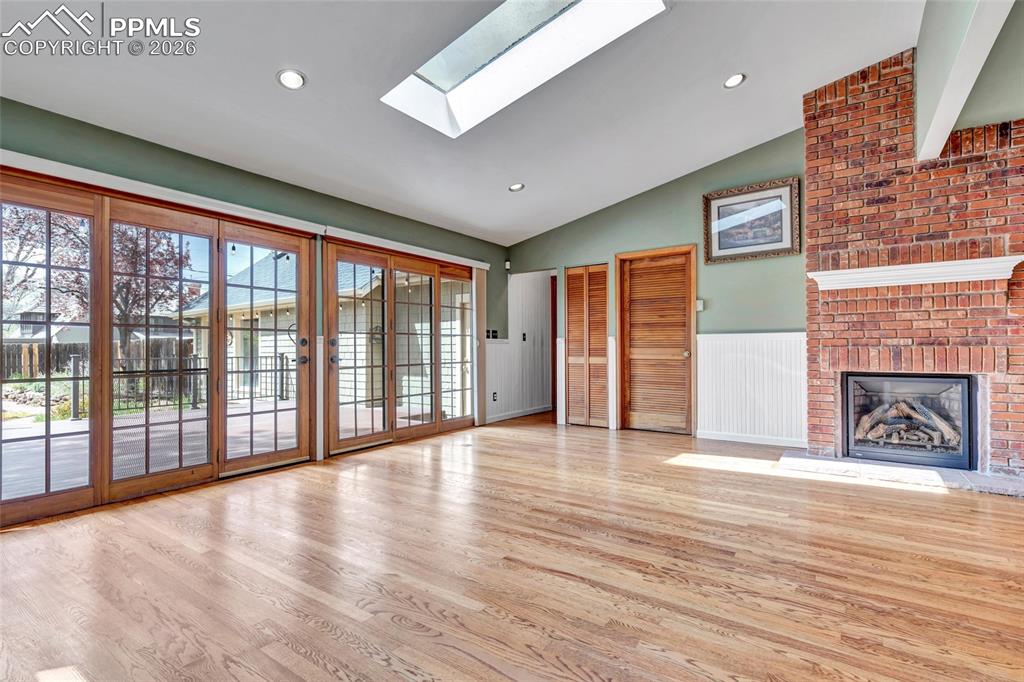 Image 11 of 46: Beautiful west facing French doors to the back deck