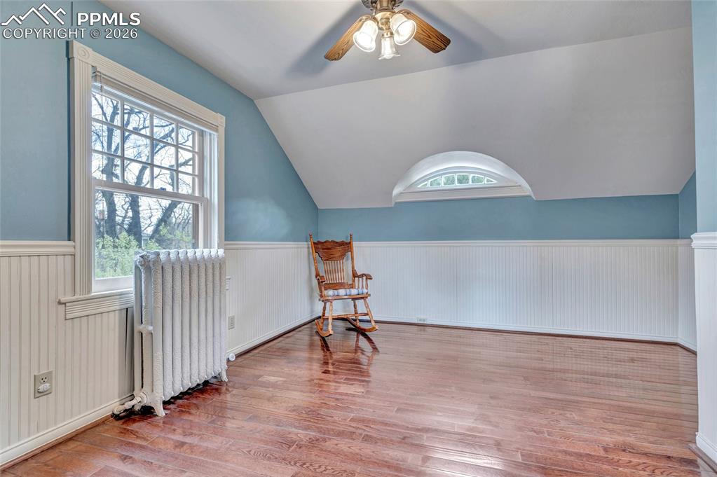 Image 18 of 46: Upper Level Primary Bedroom with Eyebrow Window