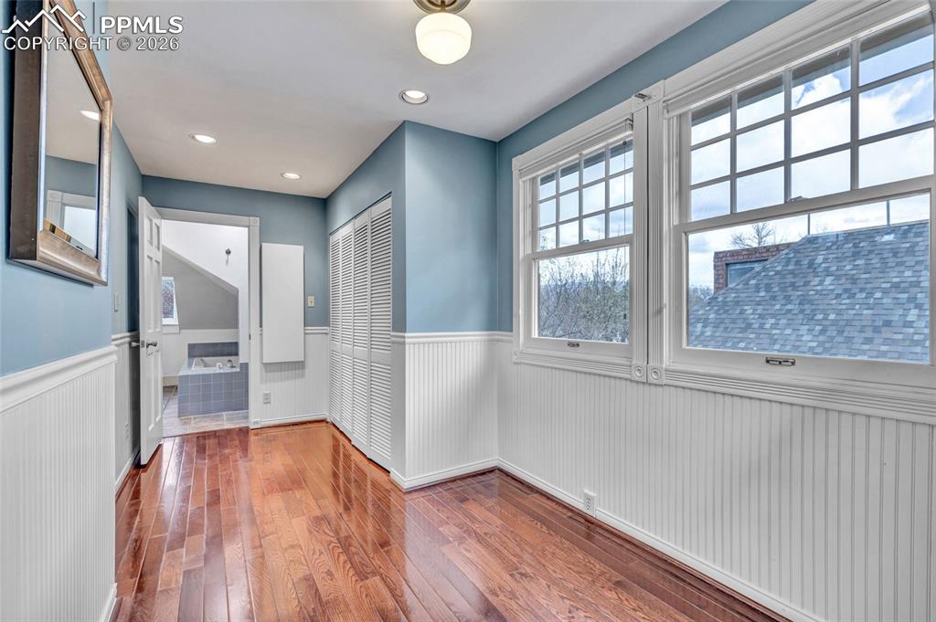 Image 20 of 46: Walk Thru Closet