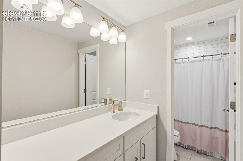 Image 34 of 45: Full bathroom in basement