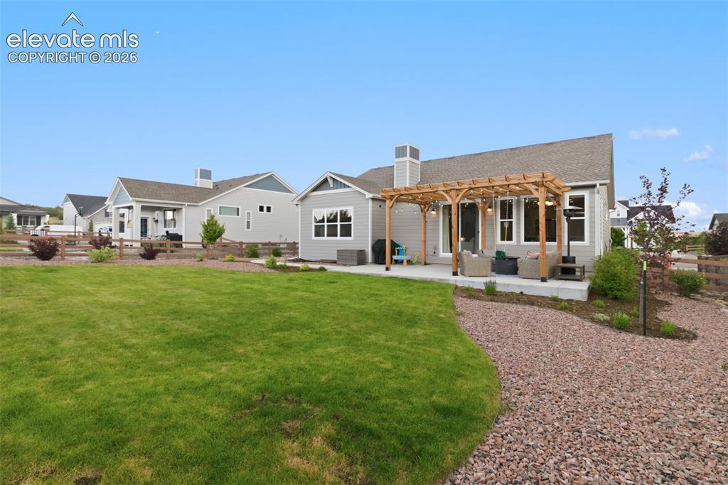 Image 43 of 45: fully fenced/ landscaped yard
