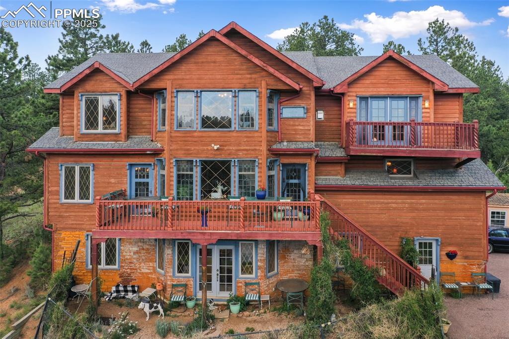 Caption: Back of house featuring french doors