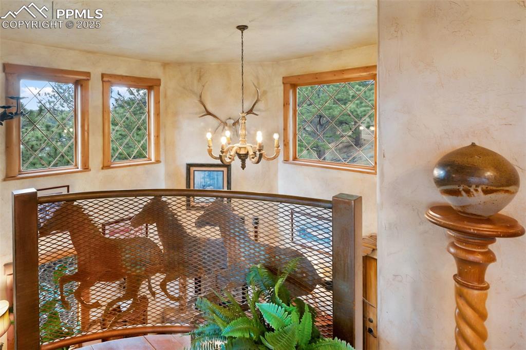 Image 26 of 50: Dining room with a chandelier