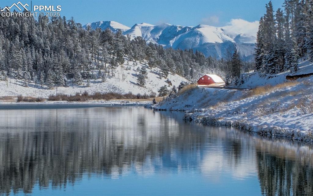 Image 50 of 50: Water view with a mountainous background