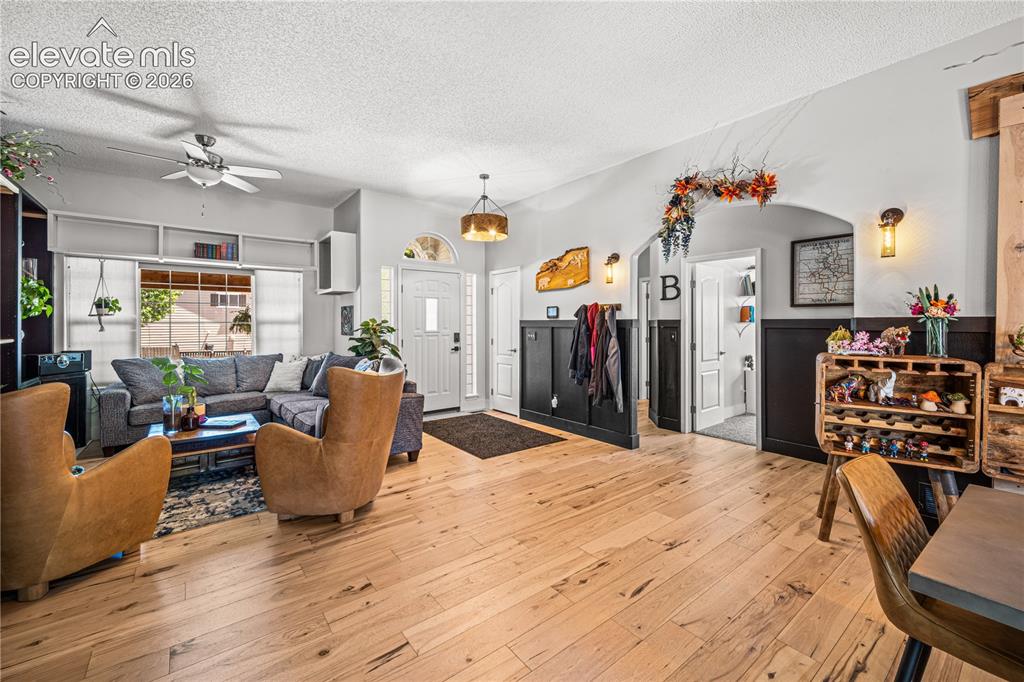 Image 5 of 50: Hardwood-style flooring throughout